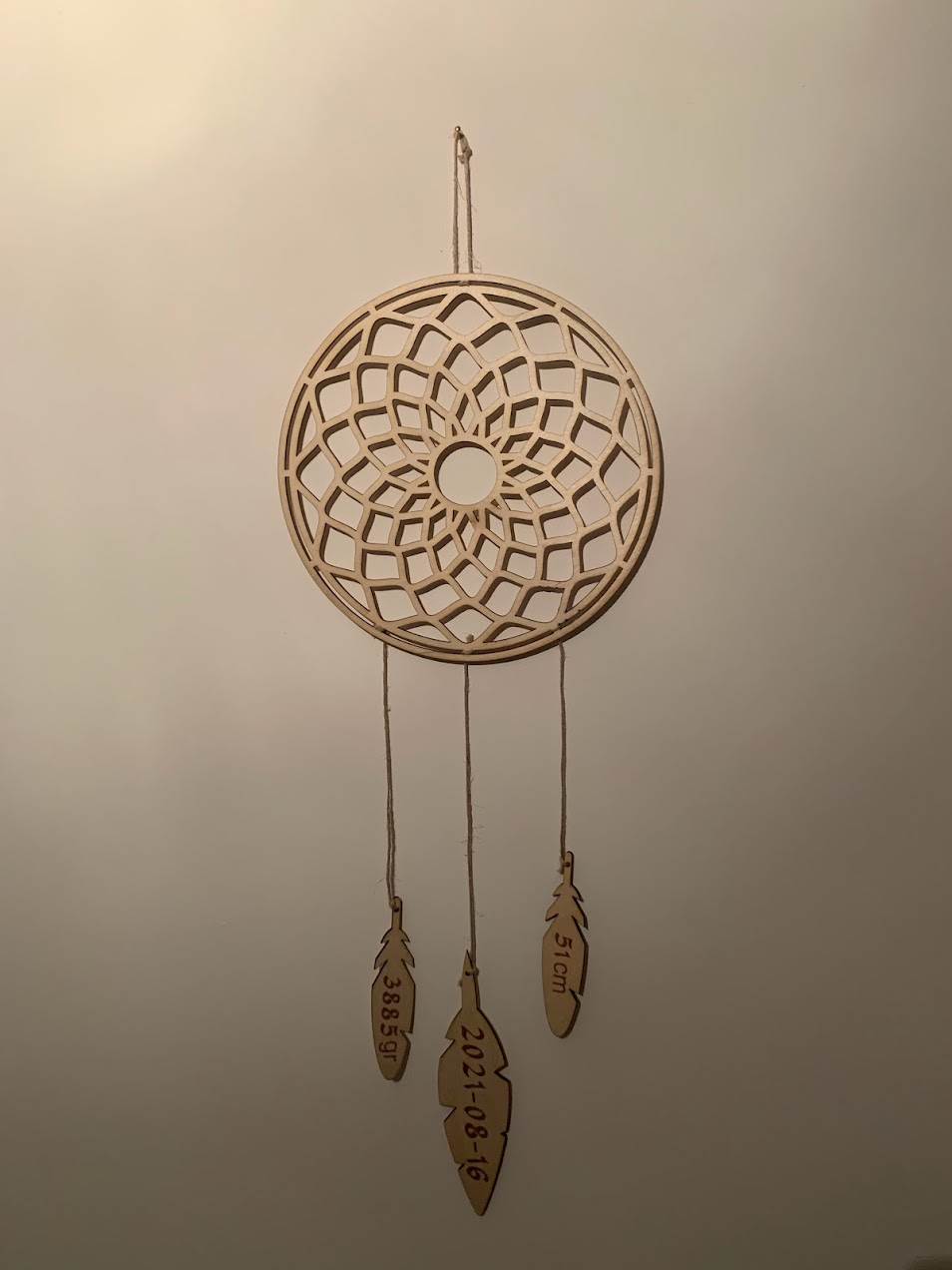 A lasercut dream catcher ornament I made for my son’s birth.