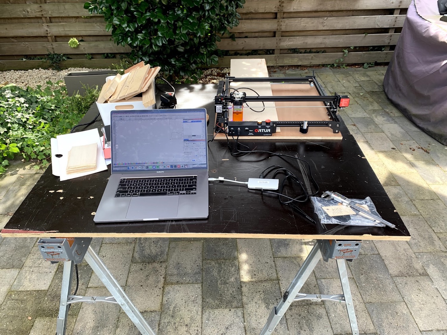 Laser cutting setup - outside, because laser cutting produces nasty fumes!