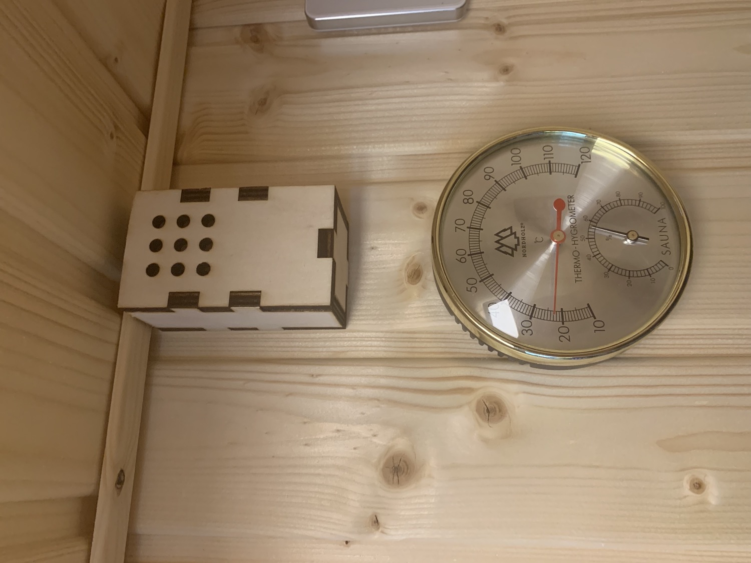 The BME sensor inside a lasercut enclosure. I generated the box template using the excellent [boxes.py tool](https://www.festi.info/boxes.py/) and added the holes using the lasercutter software [Lightburn](https://lightburnsoftware.com/).