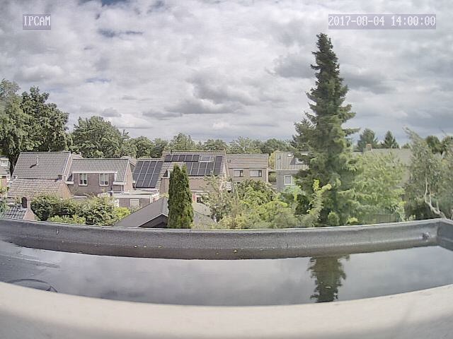 Snapshot from the camera. Notice the standing water on the flat roof in the forefront.